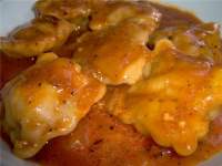 Вареники с рыбой под томатным соусом