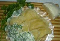 Вареники с брынзой и острым молочным соусом